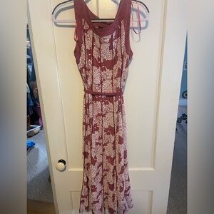 Pinkish red dress with floral design